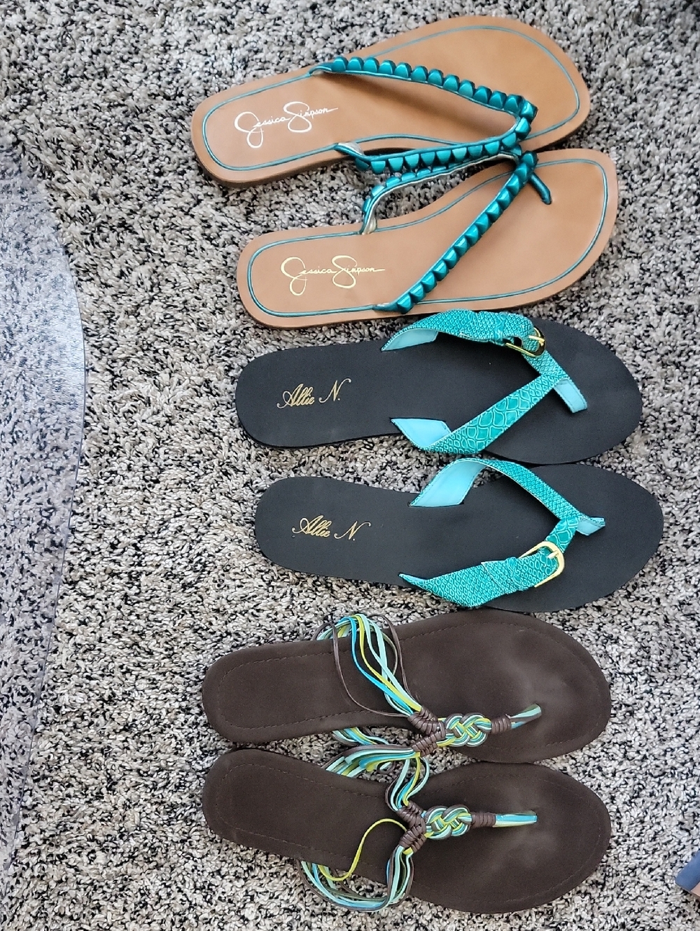 3 pairs of teal flip flops